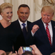 President Donald Trump, right. participates in a Polish-American reception with the President of Poland Andrzej Duda and his wife Agata Kornhauser-Duda in the East Room at the White House on June 12, 2019 in Washington, DC
